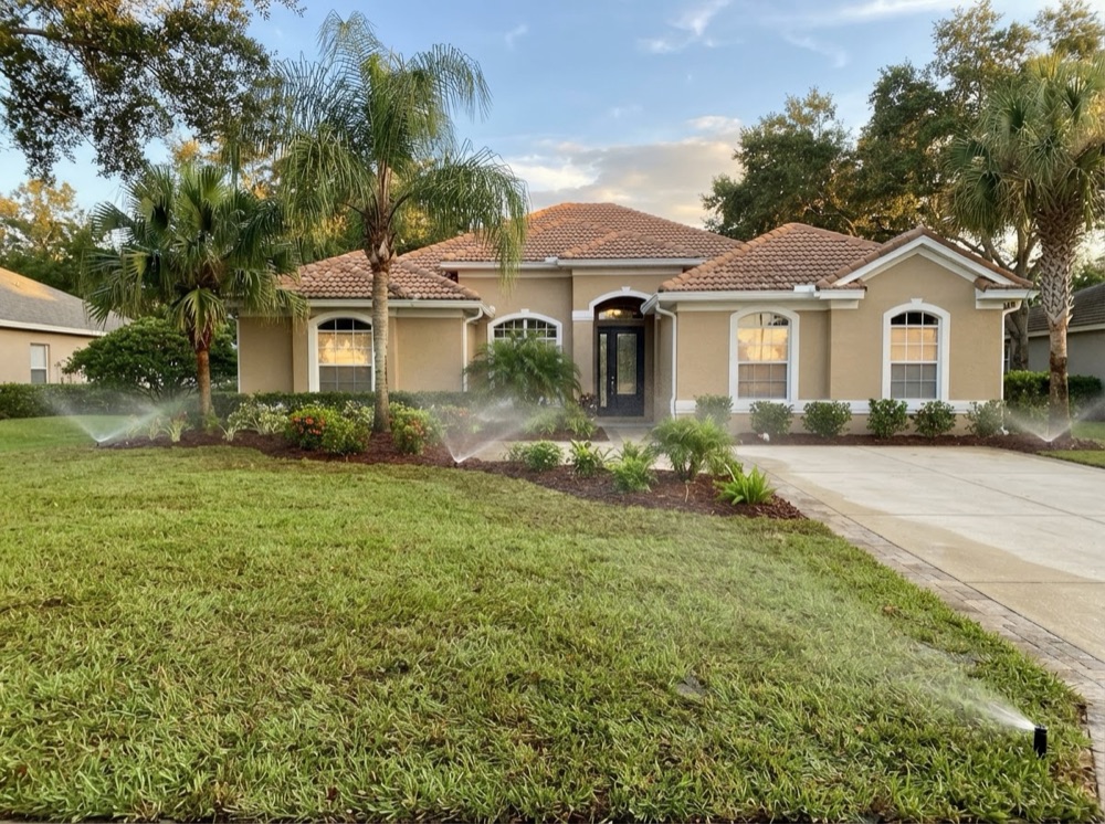 Completed landscape install with new sprinkler coverage (illustrative image)